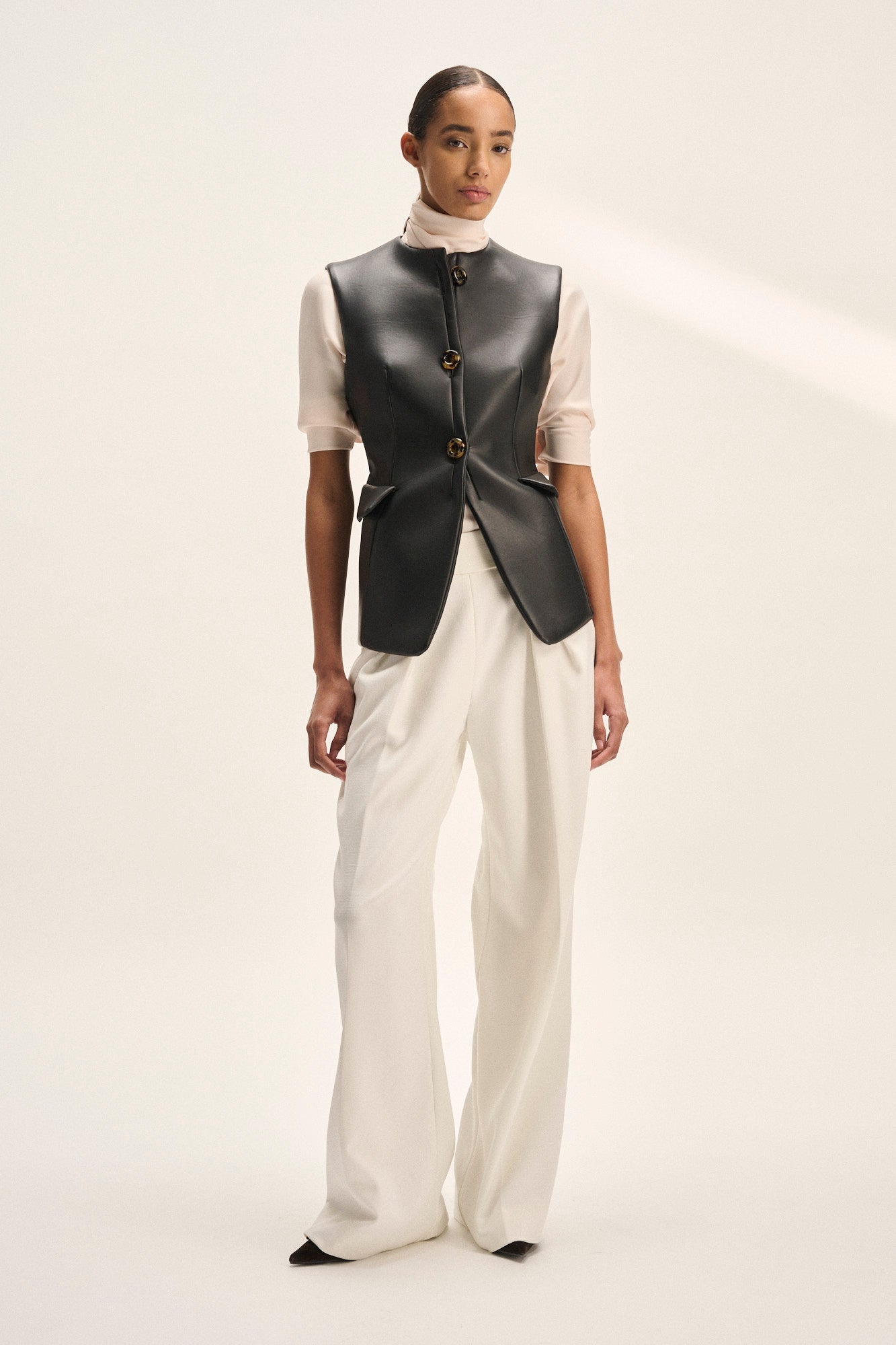 Decor sleeveless jacket in black