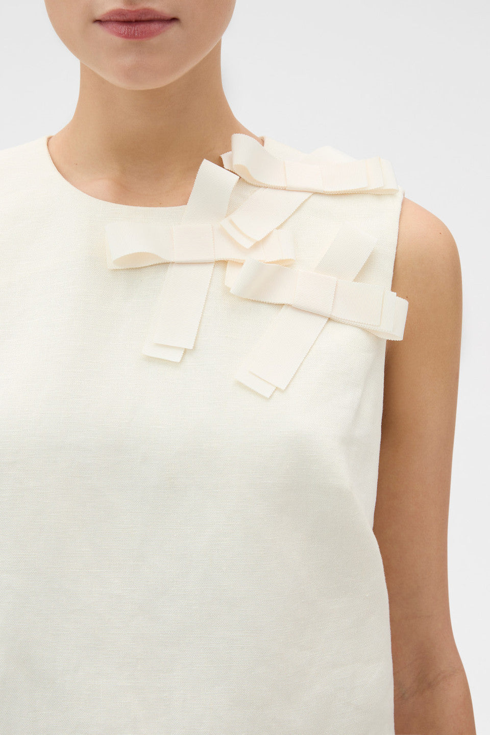 Bow detail shell soft cream