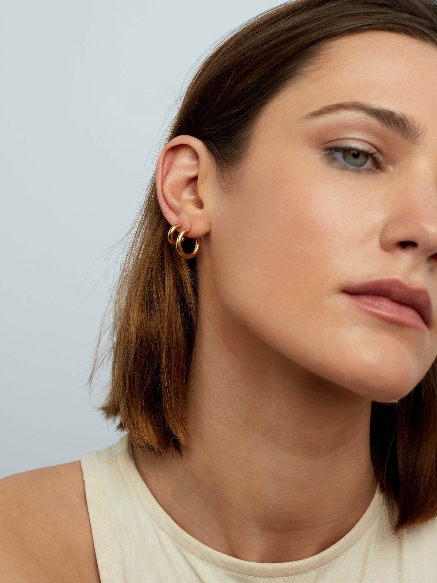 Gold huggie earrings