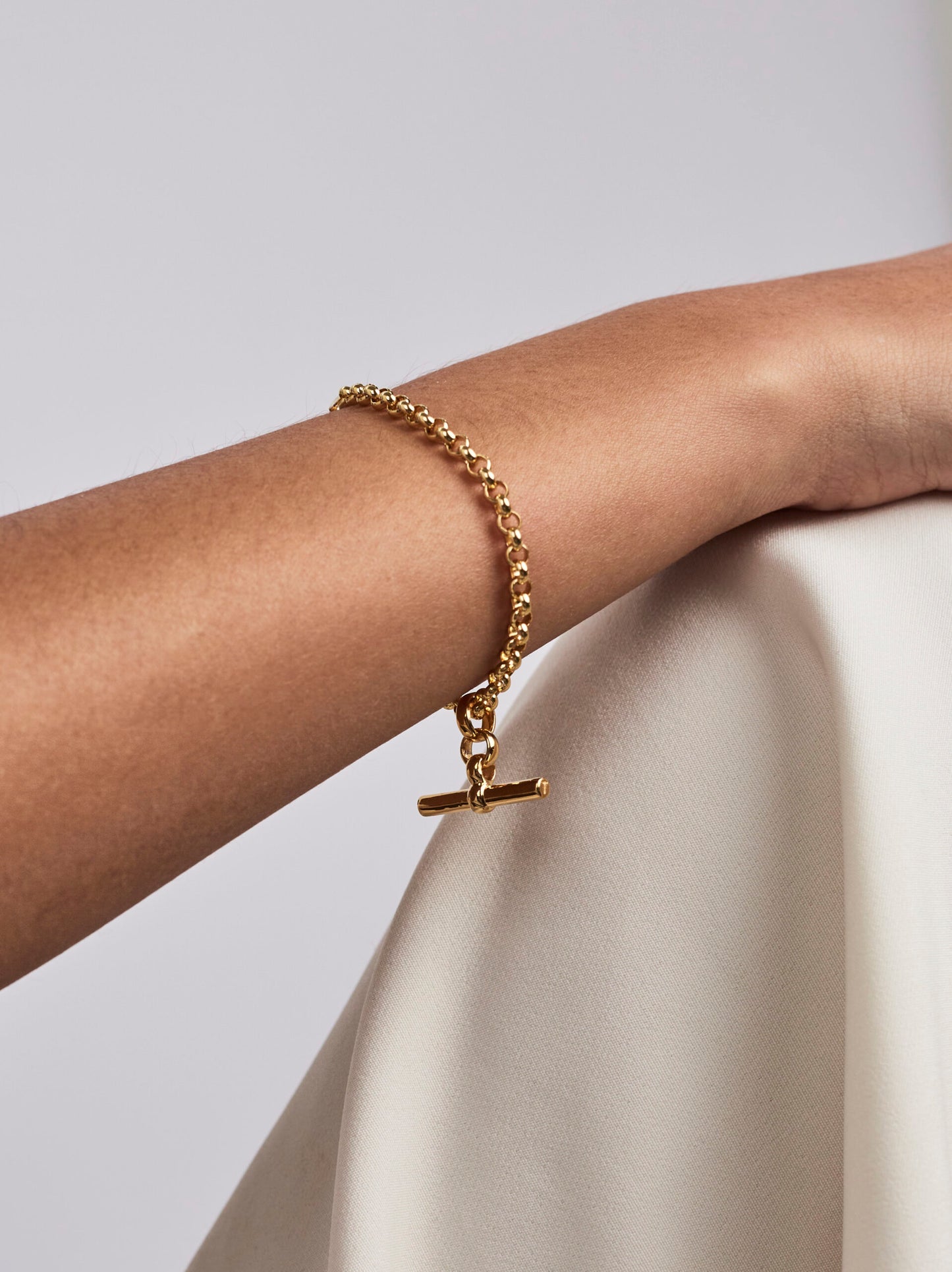 Gold belcher bracelet with gold T bar