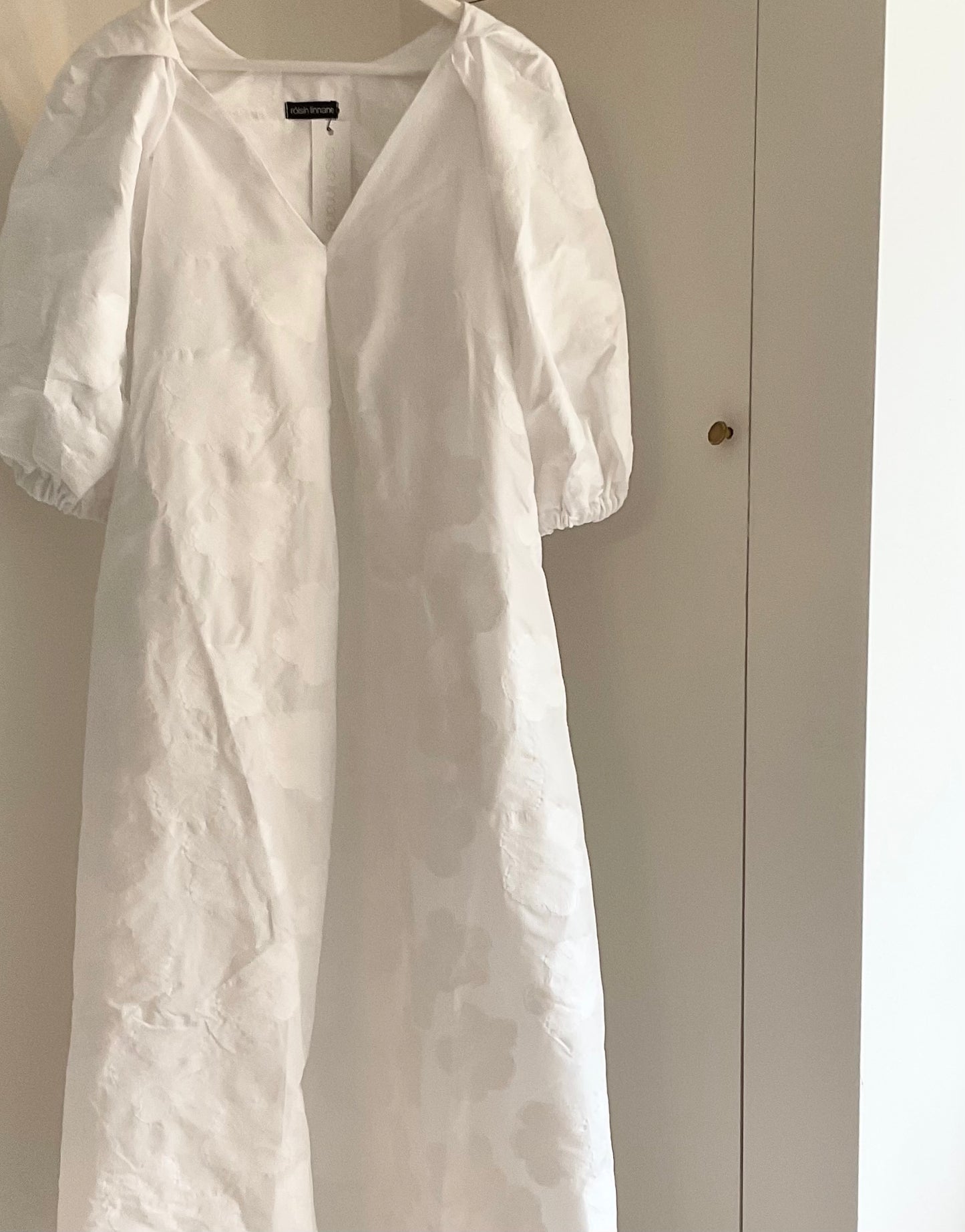 Lennon in white brocade
