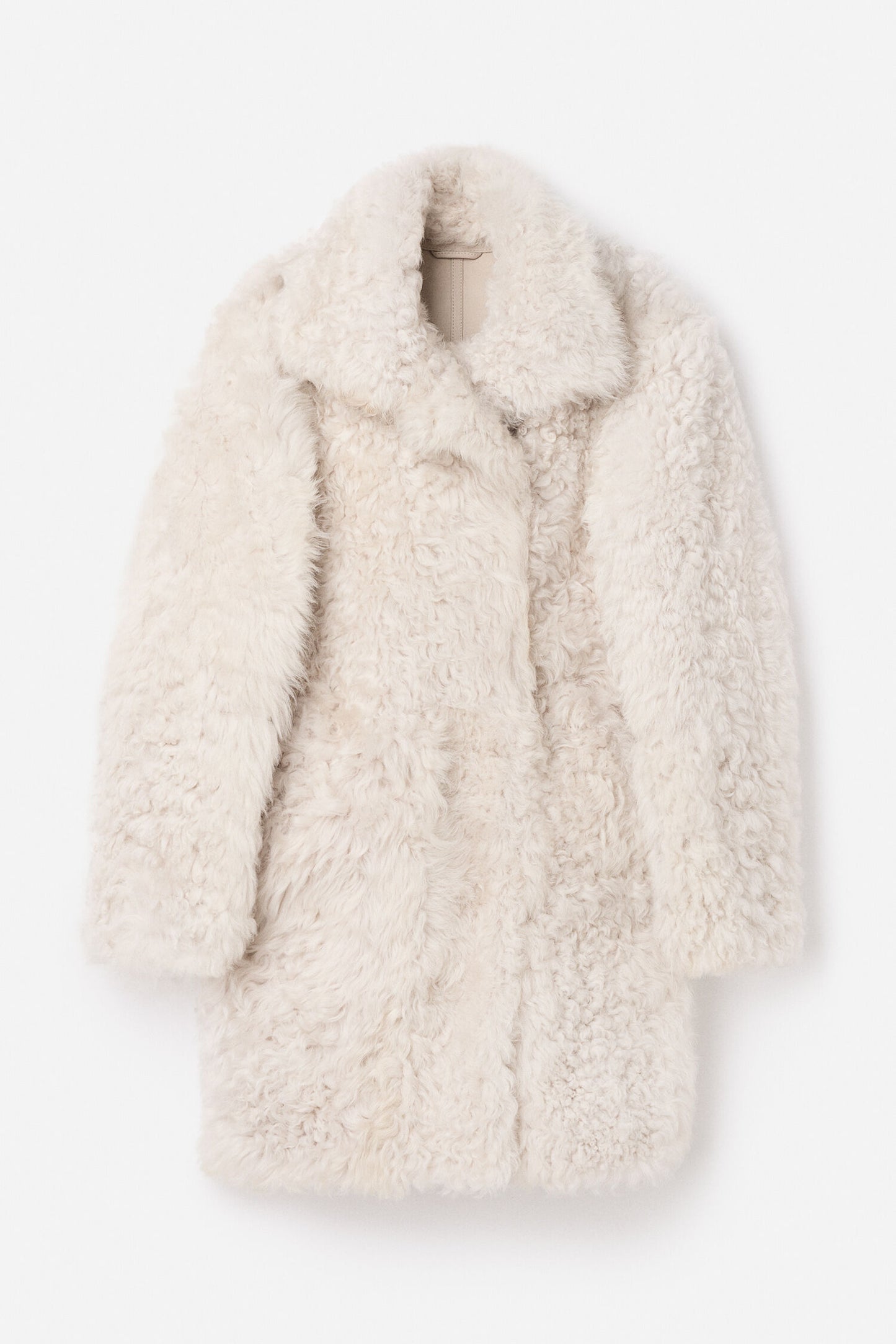 Reversible shearling coat