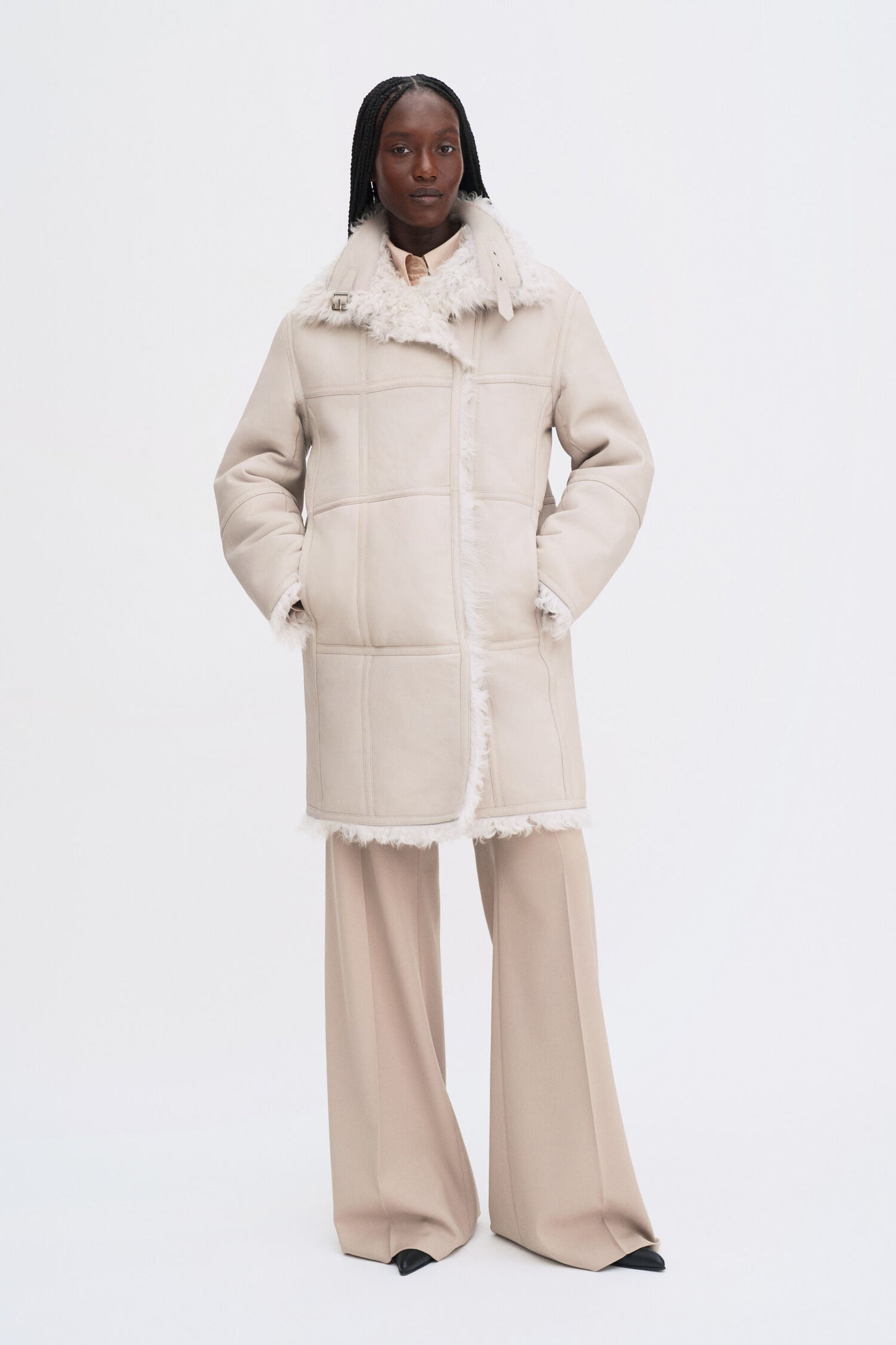Reversible shearling coat