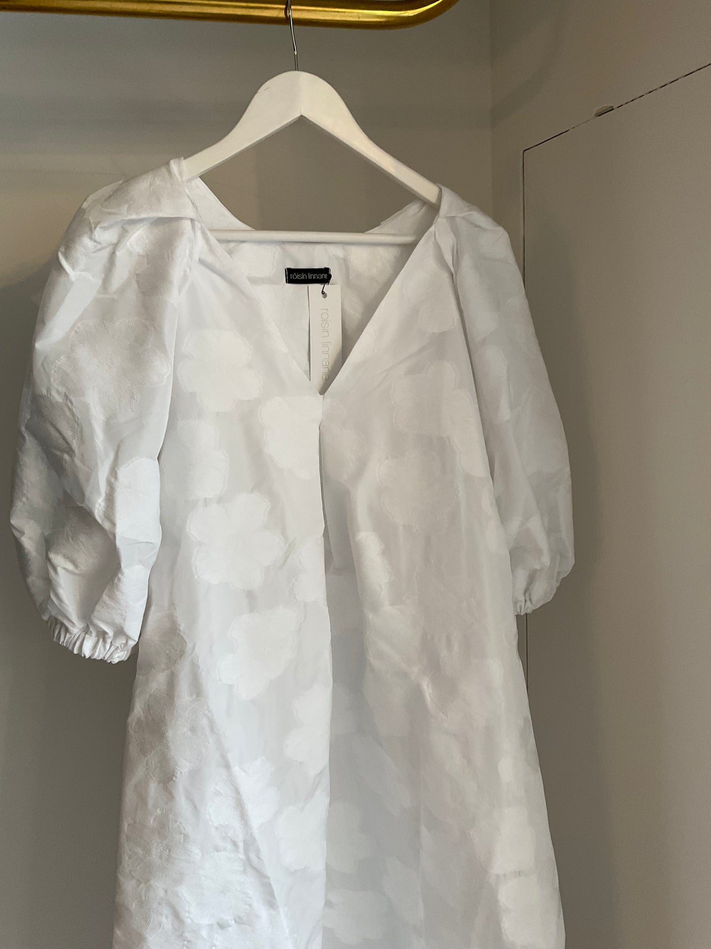 Lennon in white brocade