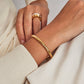 Gold torque bracelet