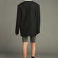 Lars coat                                   Oversized beige jacket with turned down collar