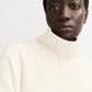 Girlfriend turtleneck feather white
