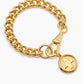 Large gold Moi & Toi disc on large clip bracelet