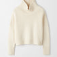 Girlfriend turtleneck feather white