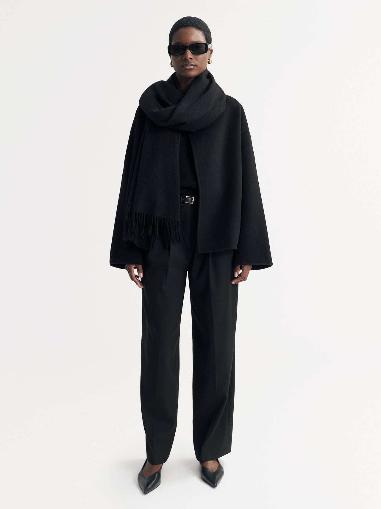 Woven black scarf with fringe