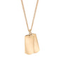 Small double gold dog tags on fine curb chain
