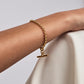 Gold belcher bracelet with gold T bar