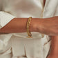 Slim gold curb link bracelet
