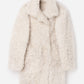 Reversible shearling coat