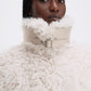Reversible shearling coat