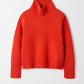 Girlfriend turtleneck tangerine