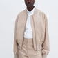 Cotton blouson jacket in sand