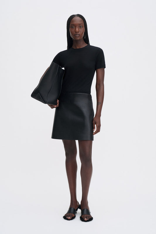Leather mini skirt black