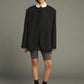 Lars coat                                   Oversized beige jacket with turned down collar