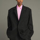 Lars coat                                   Oversized beige jacket with turned down collar